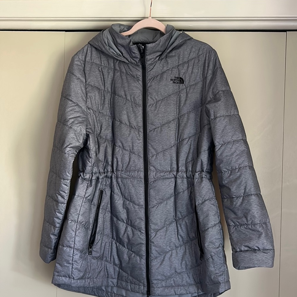 The North face jacket with hood.